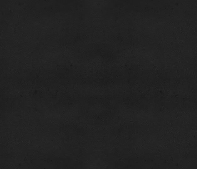 Dunkle, nahezu schwarze strukturierte Hintergrundfläche, schlicht und stimmungsvoll.